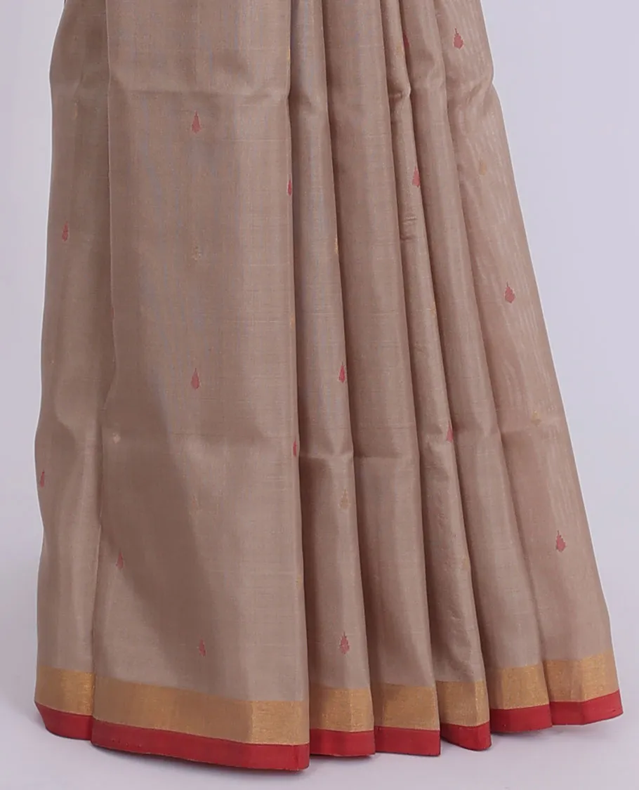 Beige uppada saree with unique buttas, contrast plain border & pallu of floral jaal designs