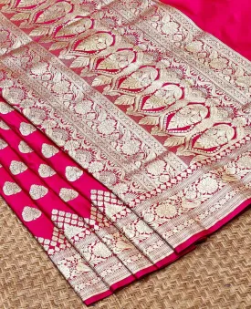 Hot pink semi banaras satin saree with unique buttas, self-border of floral creeper & pallu of intricate designs