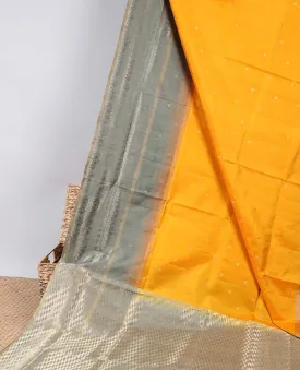 Orange soft silk saree with buttas, contrast unique design border & pallu of geometric zari designs